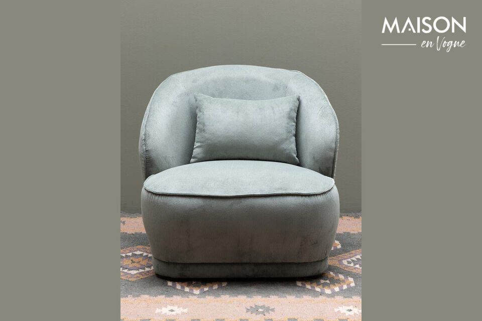 Een groene fauteuil die moderne stijl combineert met duurzaam comfort.